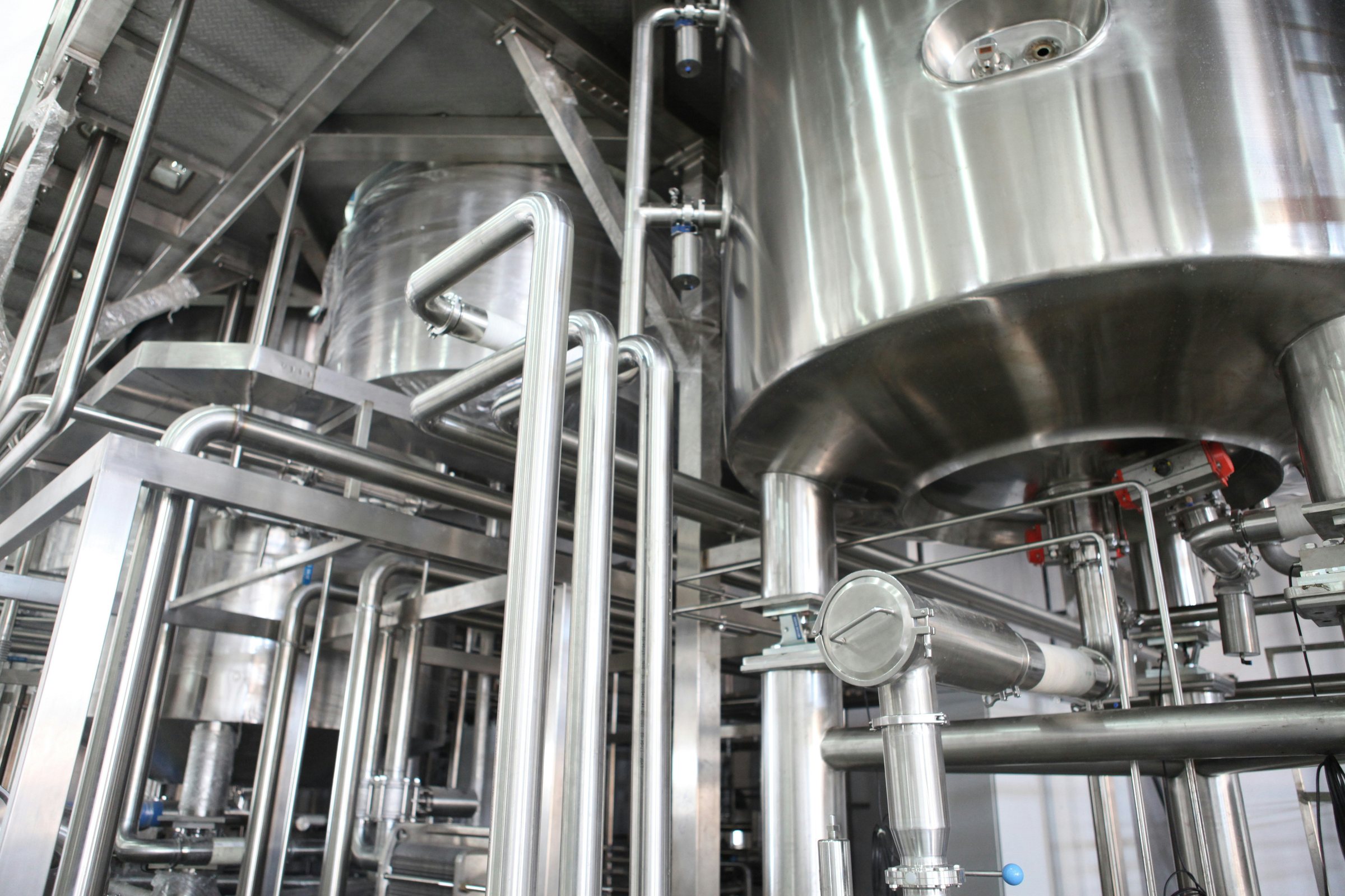 Stainless-steel liquid processing vessel and sanitary pipework